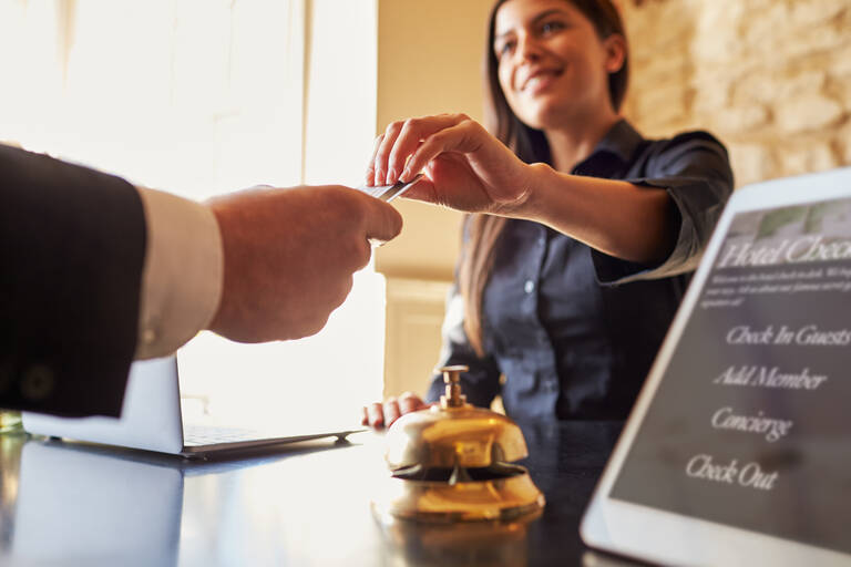 Inchecken bij het hotel Borg hotel Amerika Canada