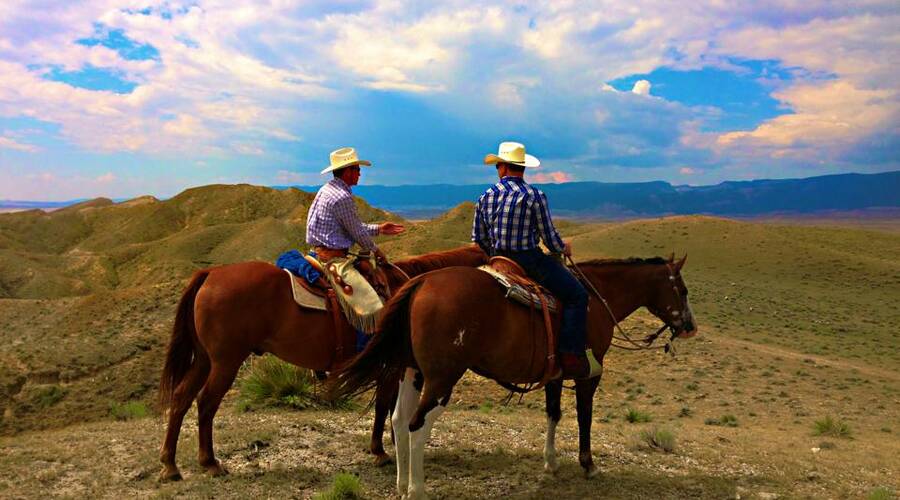 Cowboys op de TA Ranch in Wyoming